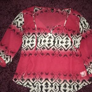 Sheer red patterned blouse